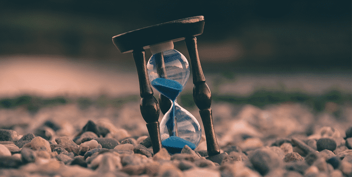 An hourglass representing the time your wasting trying to time the market